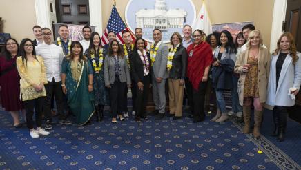 Group photo of members and staff at Diwali Celebration