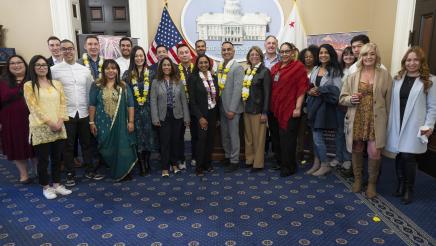 Group photo of members and staff at Diwali Celebration