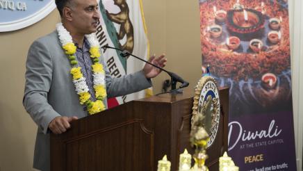 Asm. Kalra speaking during Diwali Celebration